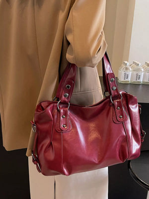 Large wine red vintage PU leather shoulder bag with silver hardware and double handles.