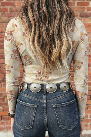 rust blouse featuring sheer and floral