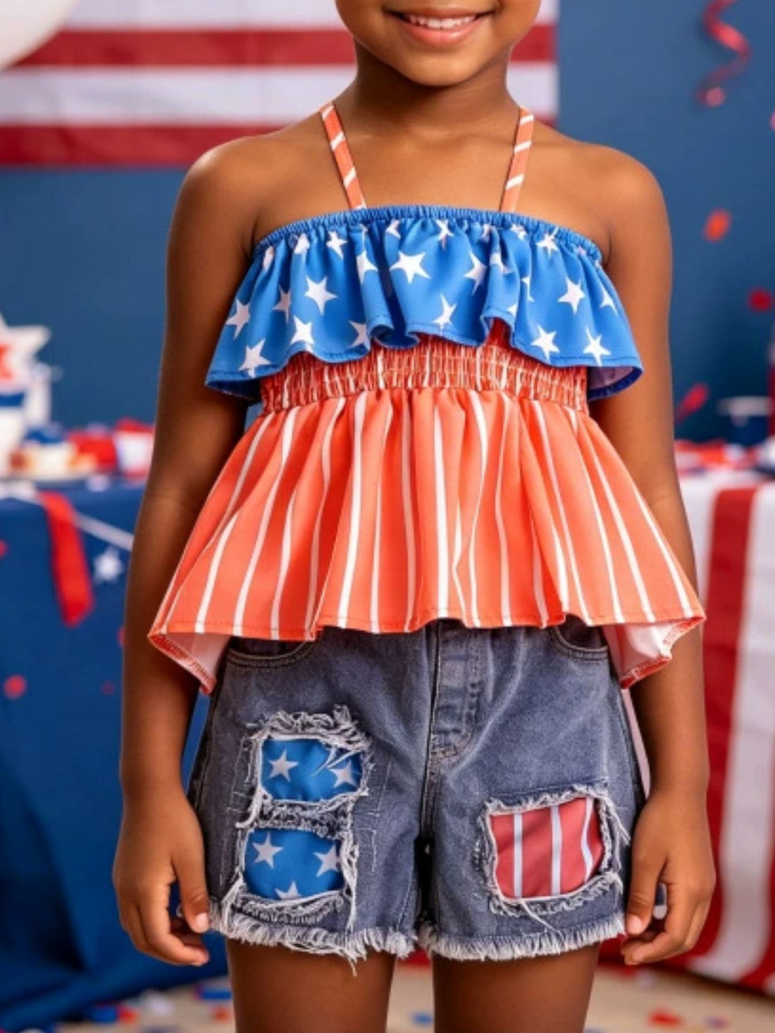 Patriotic toddler cami and shorts set with star and stripe patterns, distressed denim shorts.