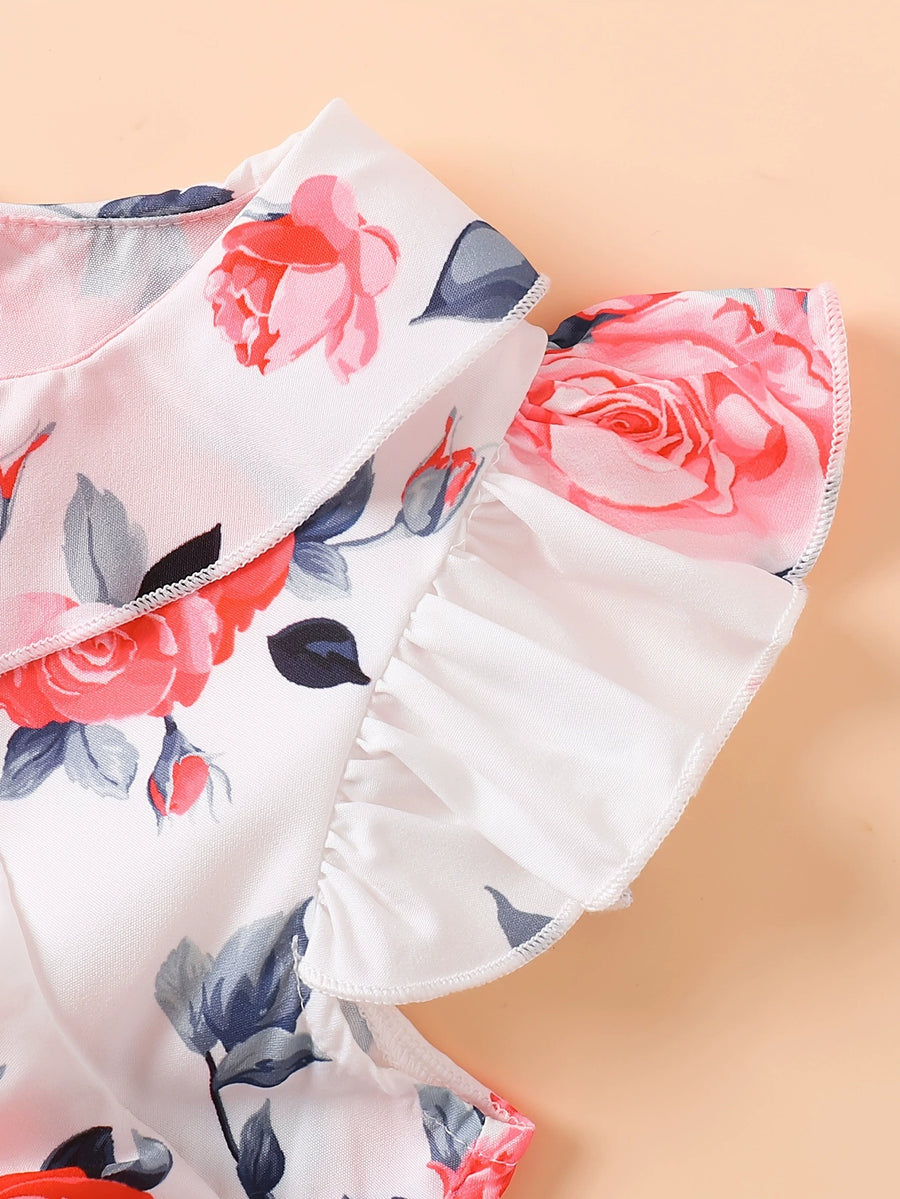 Toddler dress with floral print, ruffle cap sleeves, and collar detail.
