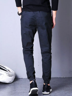Men's black casual pants with elastic cuffs and drawstring waist