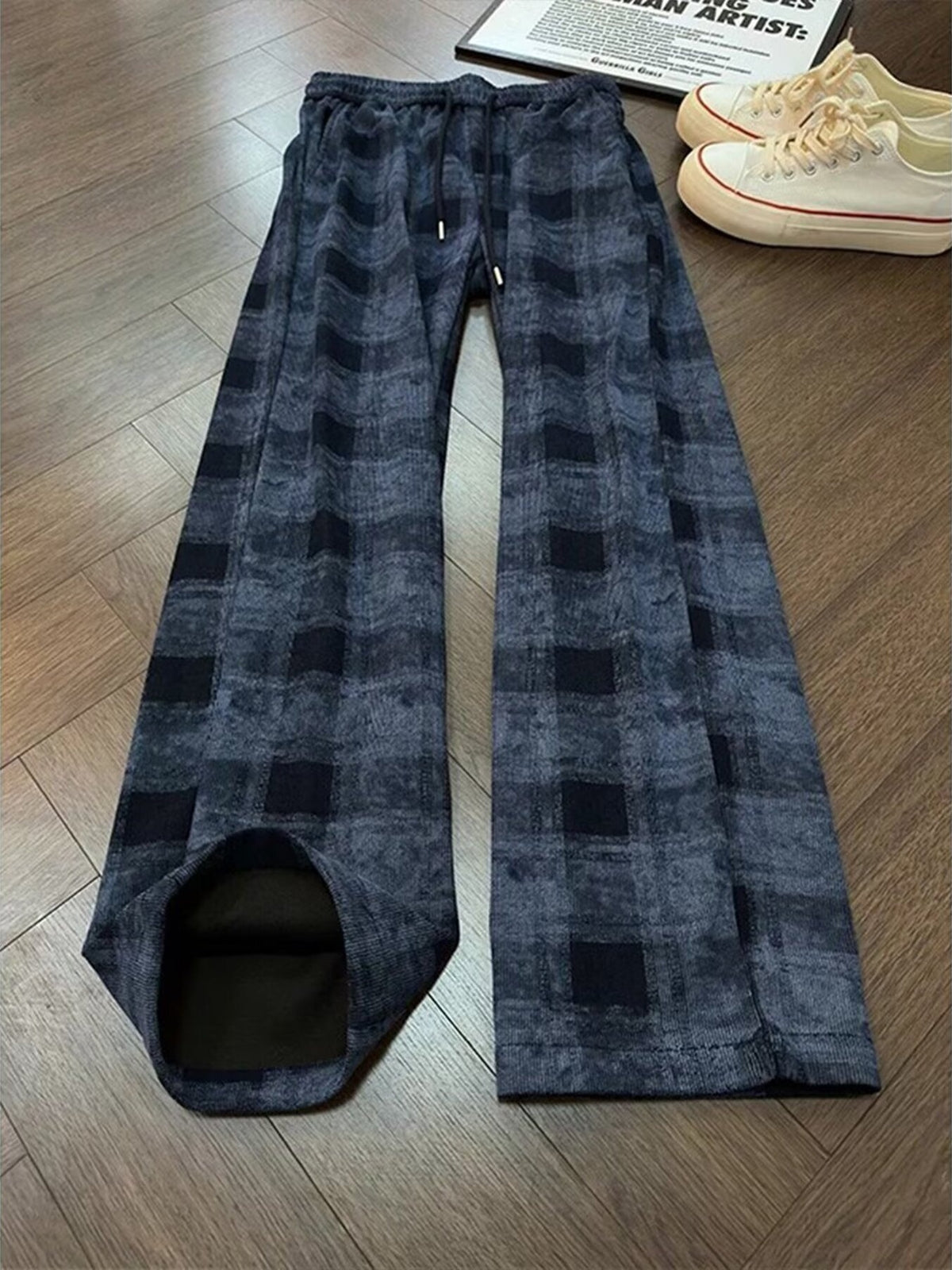 wide-leg pants in charcoal featuring drawstring waist and loose fit