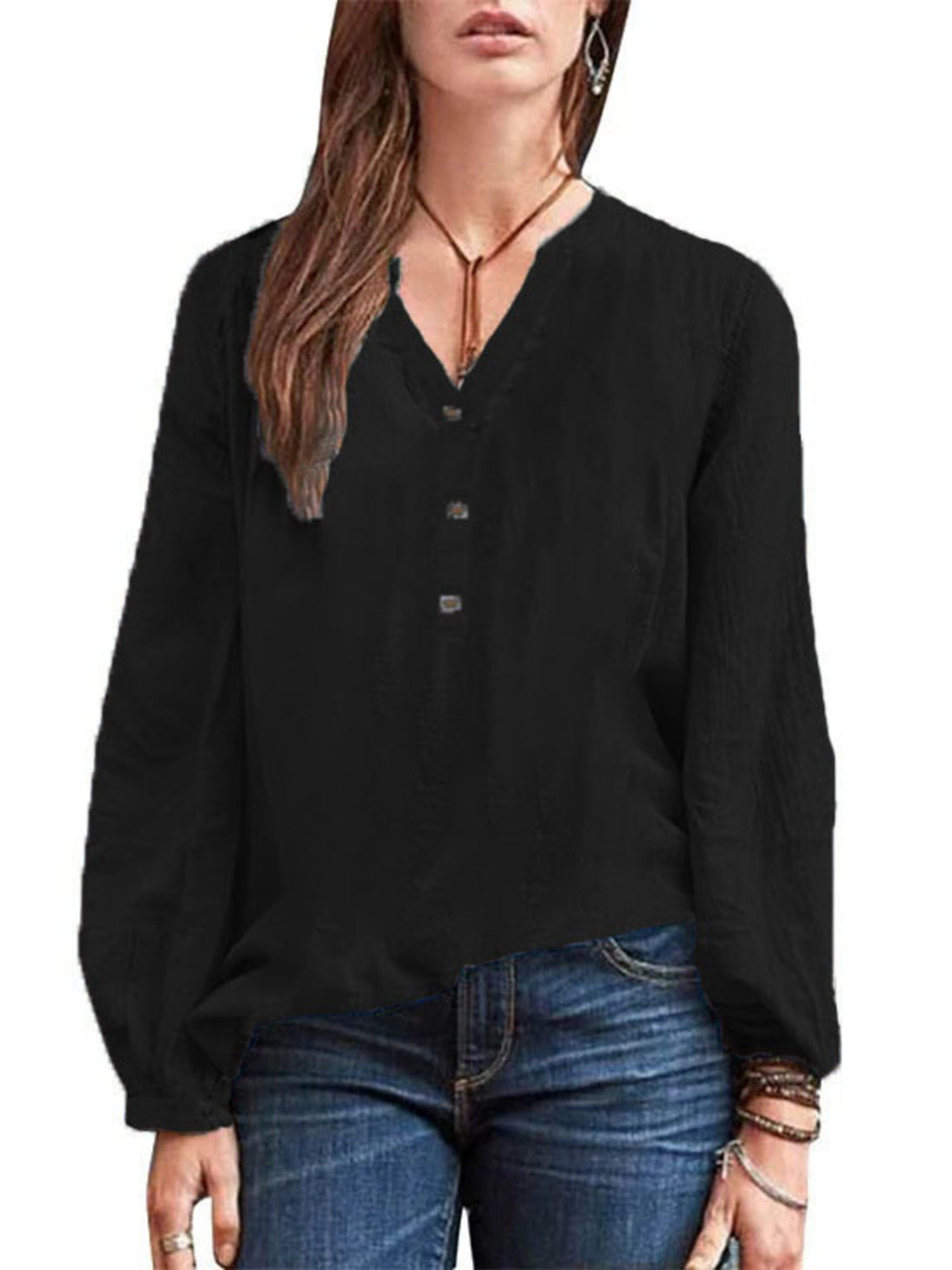 Black long-sleeve blouse with notched neckline and button detail