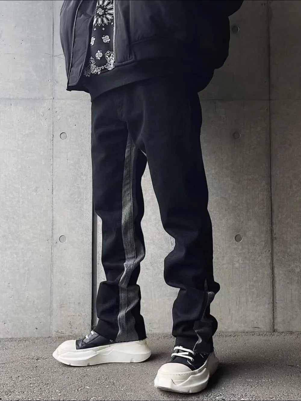 Black cotton bootcut jeans with contrast side panels