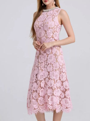 Pink lace dress with pearl embellished neckline and scalloped hem