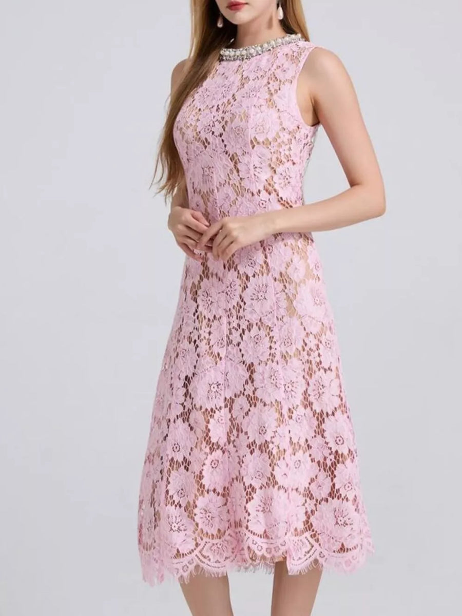 Pink lace dress with pearl embellished neckline and scalloped hem