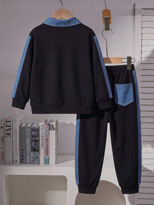 denim blue tracksuit featuring chest pocket and color-block