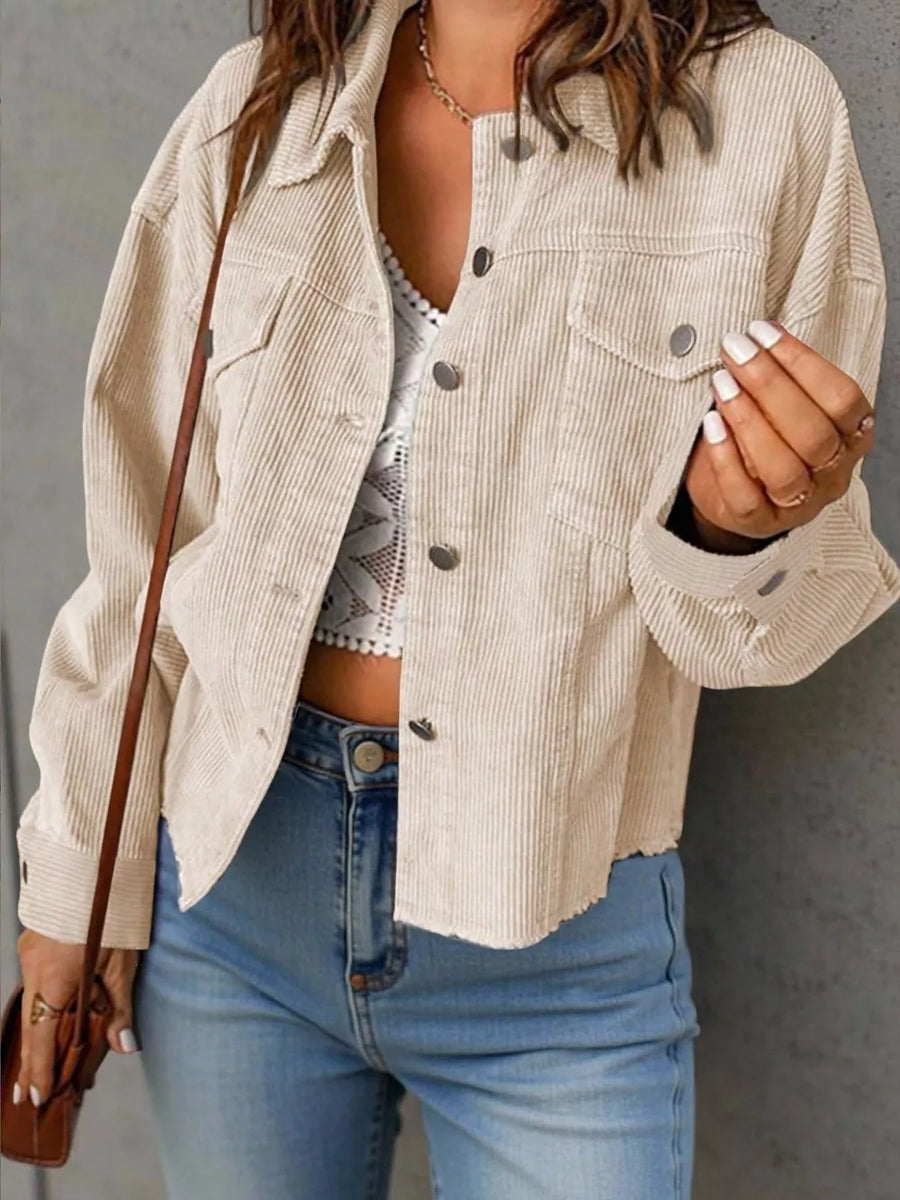 shacket in cream featuring buttoned and relaxed fit