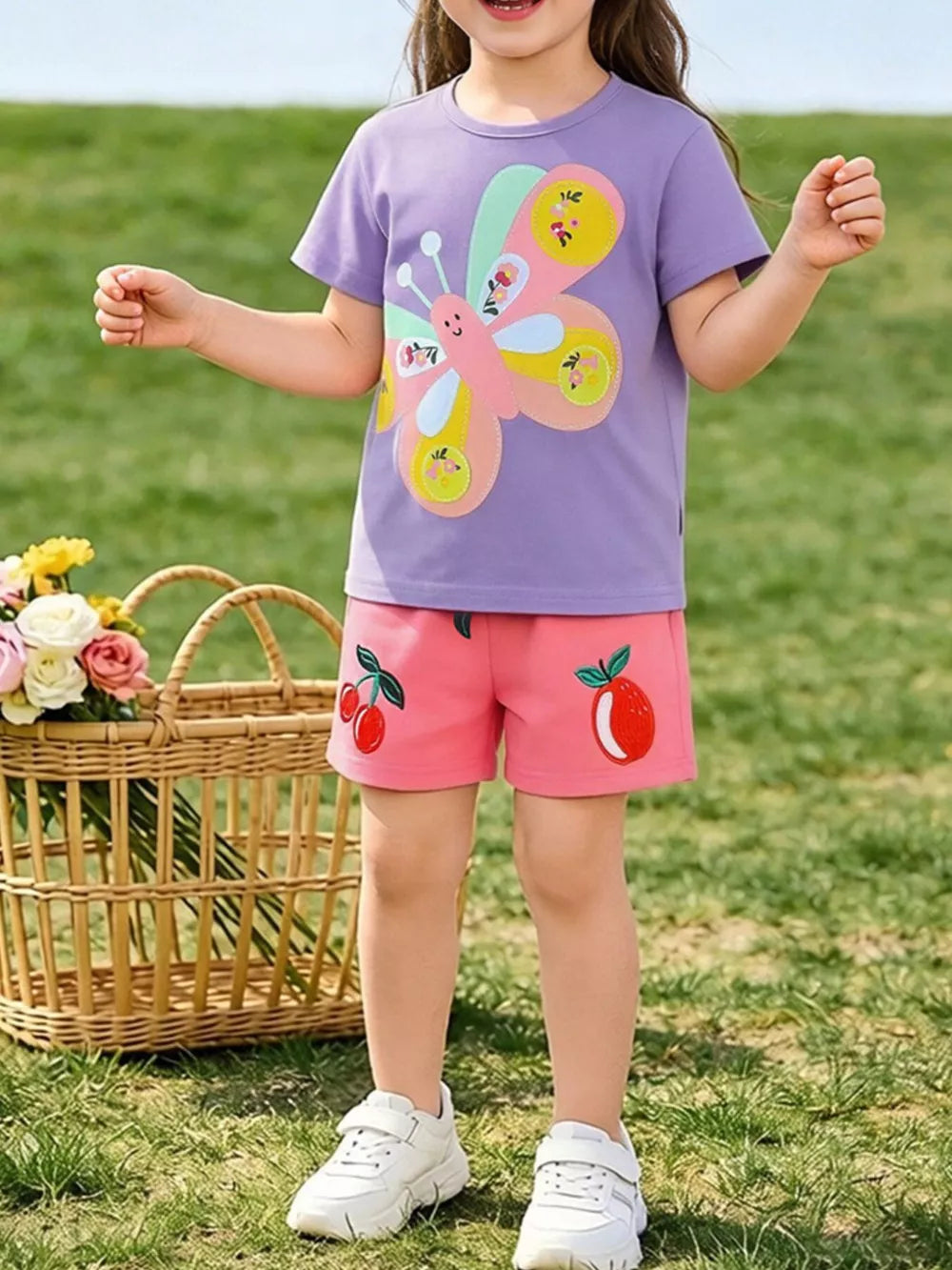 Purple butterfly graphic tee and pink fruit print shorts set for baby girls