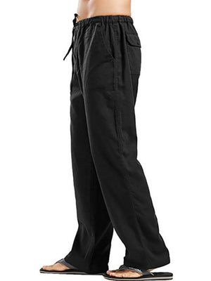 Black linen drawstring trousers with relaxed fit and side pockets.
