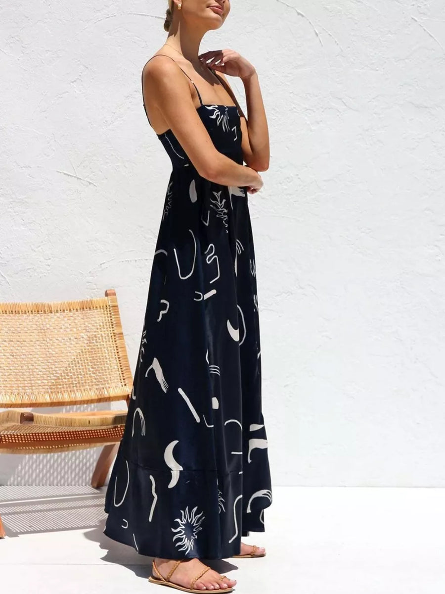 Dark Navy maxi dress with spaghetti straps and abstract white print.