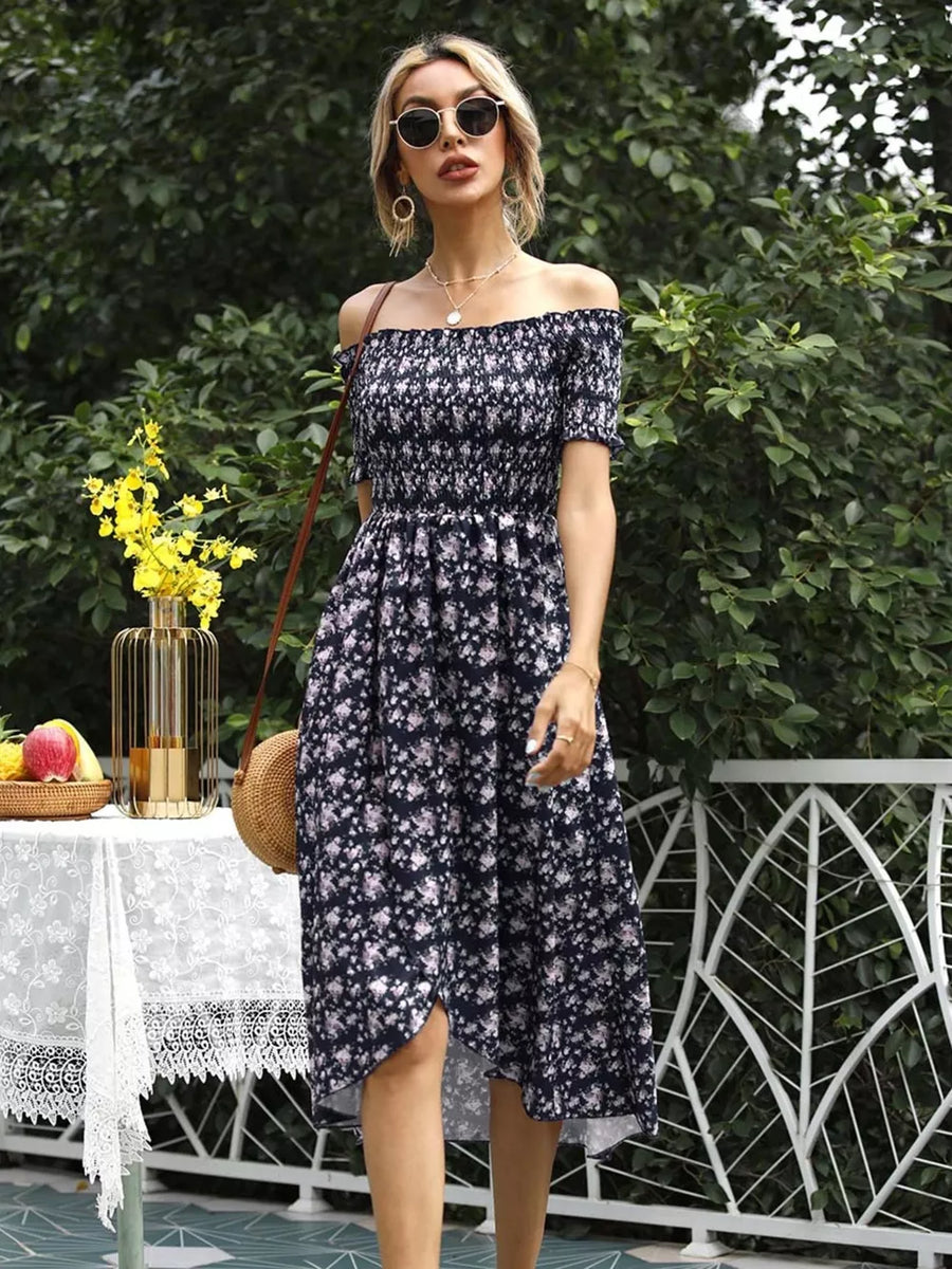 Floral off-shoulder midi dress in dark navy with a ruffled hem and slit.