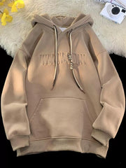 Tan cotton blend hoodie with drawstring, embossed text, and front pocket.