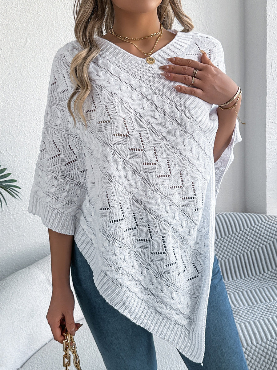 White cable knit poncho with chevron detail and V-neck