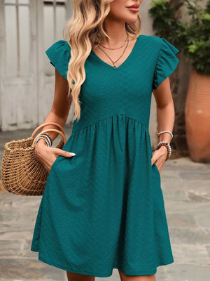 Peacock blue a-line dress with ruffled sleeves and v-neck, textured fabric, above knee length.