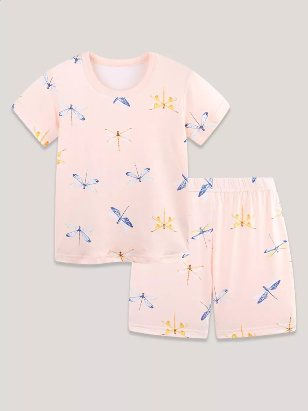 Toddler pajama set with short sleeves and shorts in pink with a dragonfly print.