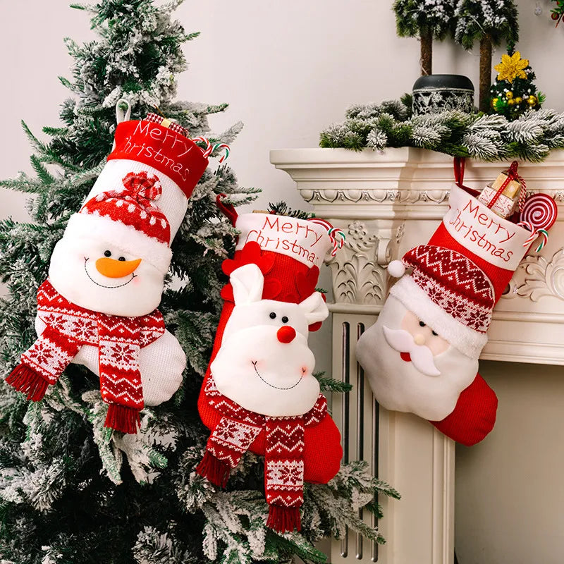Three whimsical Christmas stockings: snowman, reindeer, and Santa, with "Merry Christmas" text.