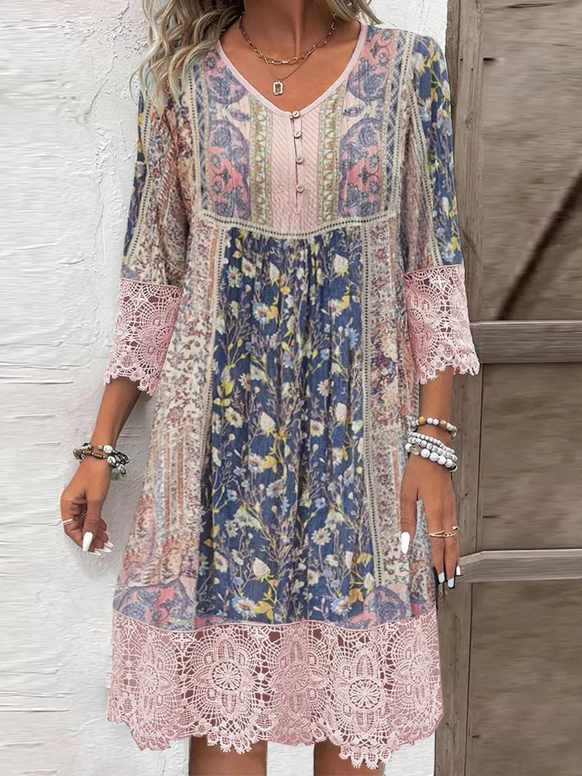 Pink floral lace trim V-neck dress with bohemian patchwork print and 3/4 sleeves.