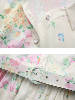 Apricot floral midi dress with button front, belt, and ruffle sleeves.