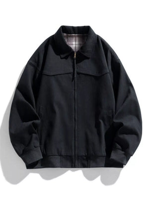 Black oversized zip-up jacket with plaid lining and elastic cuffs.
