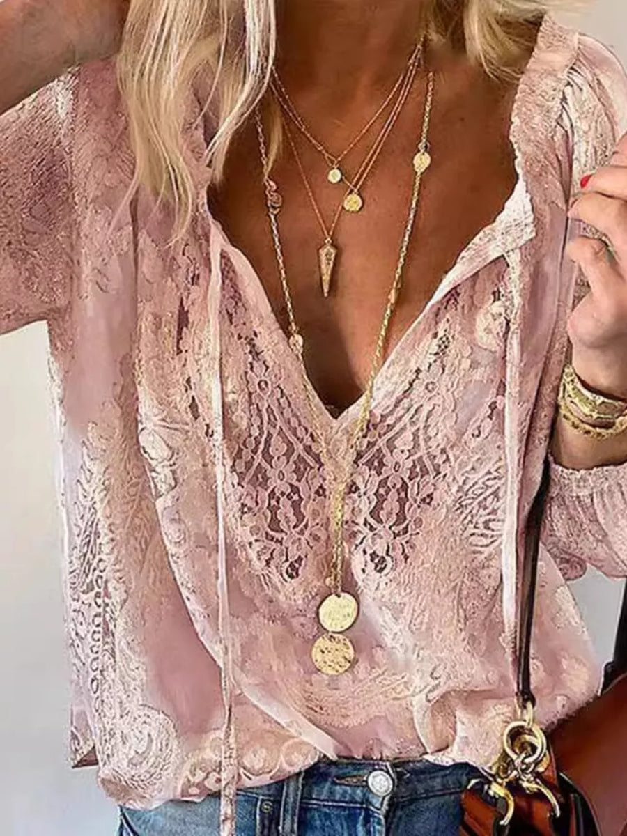ivory blouse with tie neck and long sleeve