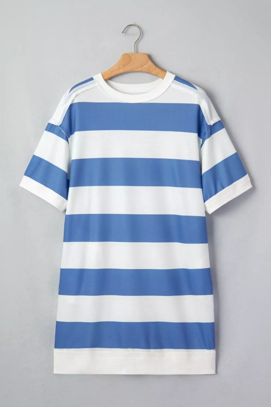 Striped t-shirt dress with blue and white horizontal stripes, crew neck, and short sleeves.
