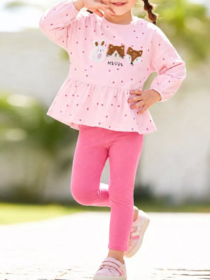 light pink peplum top with polka dot and round neck