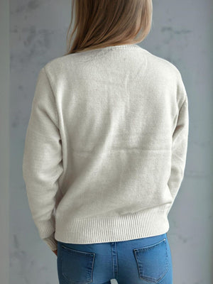 White acrylic button-up cardigan with ribbed cuffs and hem