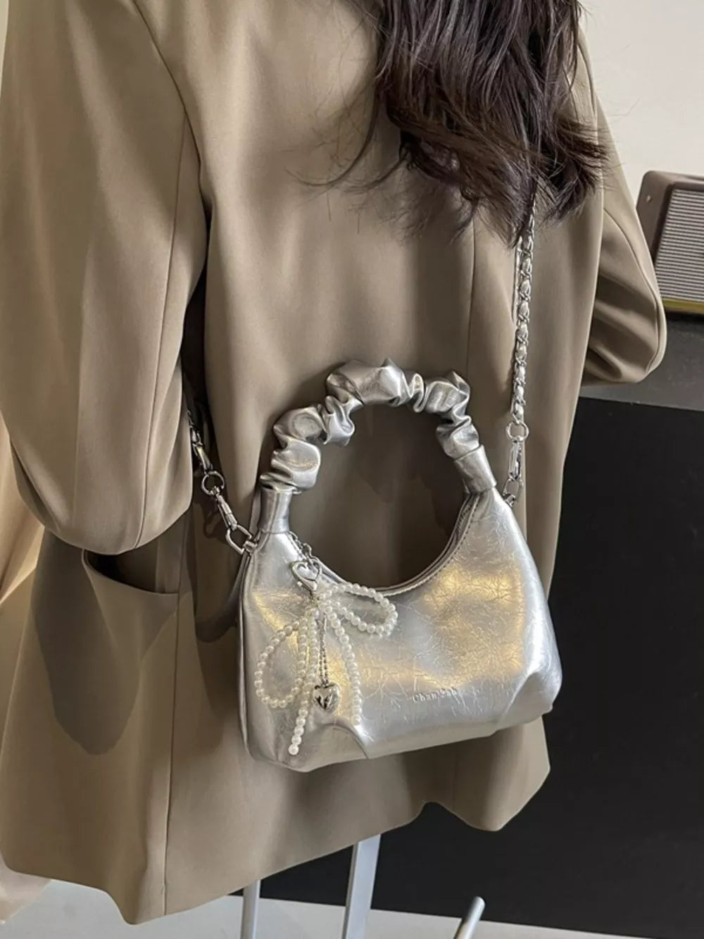 Silver ruched mini crossbody bag with pearl pendant and heart charm