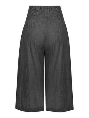 Wide leg cropped pants in charcoal grey with a high smocked waist