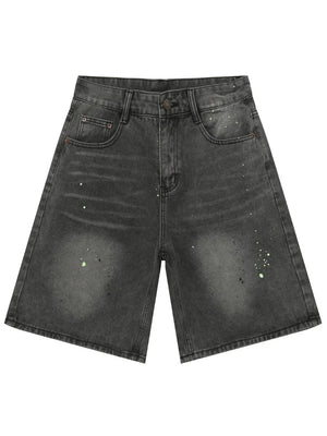 Dark wash denim bermuda shorts with paint splatter detail