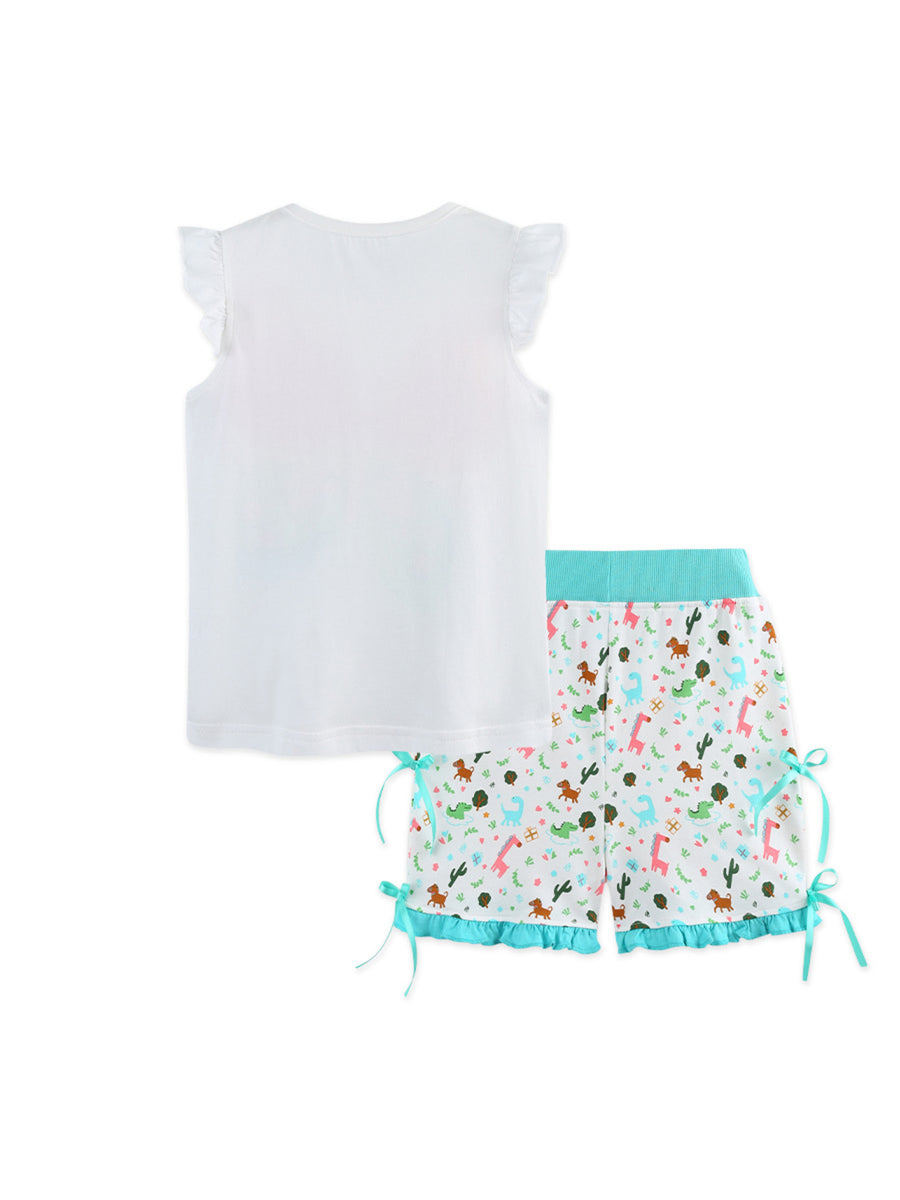 White cotton set with butterfly ruffle sleeves and animal print shorts with turquoise trim.