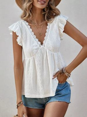 White eyelet blouse with lace trim and ruffle sleeves