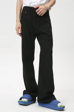 Black wide-leg denim trousers with a casual fit.