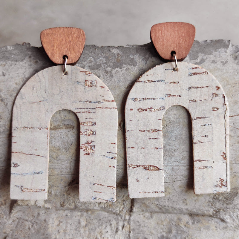 Archway cork statement earrings with wood detail, natural texture.