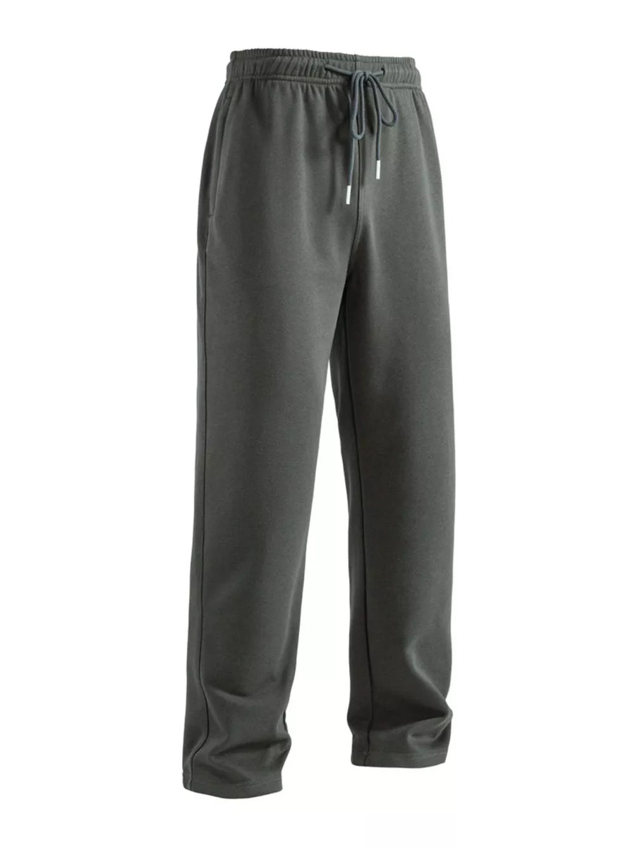 Men's dark gray drawstring loose fit sweatpants with side pockets.