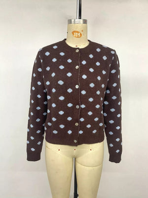 cardigan featuring polka dot in light blue with 42% acrylic, 28% polyamide, 30% polyester Care instructions: Machine wash