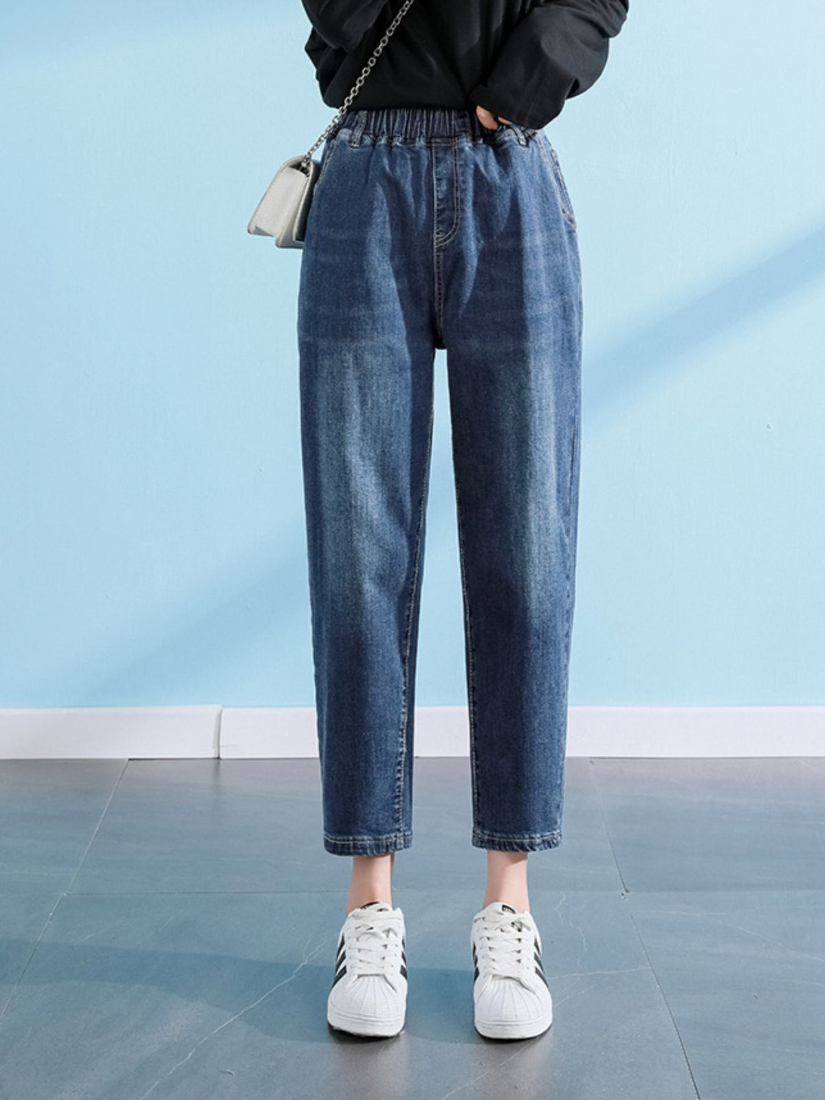 Plus Size High-Waisted Casual Jeans in medium wash denim with washed