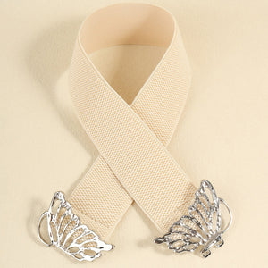 Elastic waist belt in light yellow with silver butterfly buckle detail