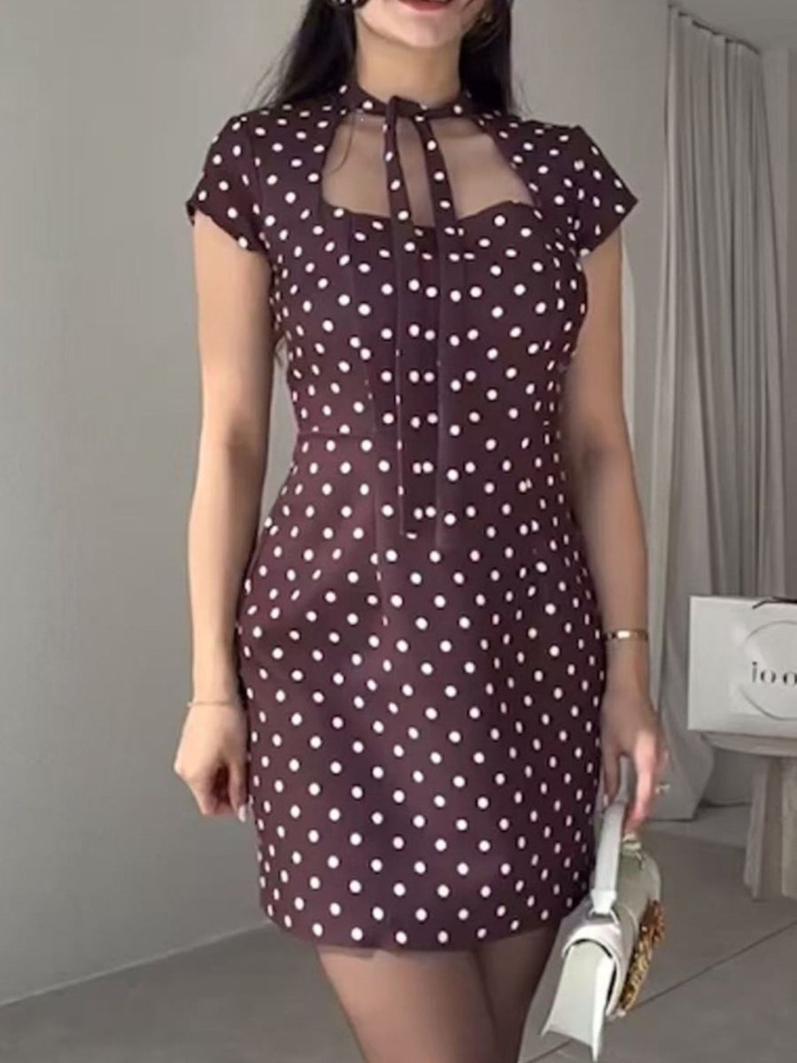 100% polyester Care instructions: Machine wash cold mini dress in Black with fitted silhouette