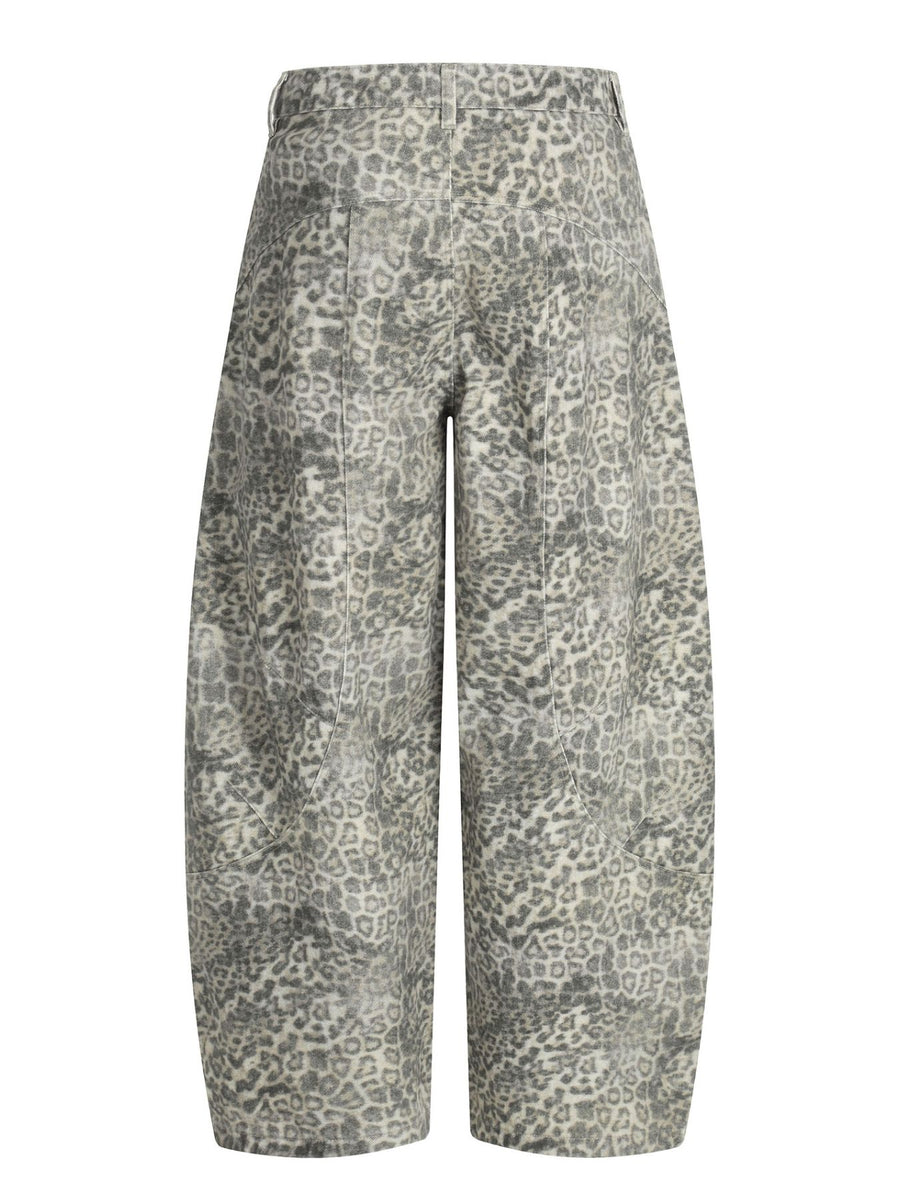 cream wide-leg pants featuring buttoned and leopard