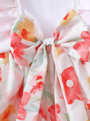 Floral print baby bodysuit with a large bow detail and matching headband.
