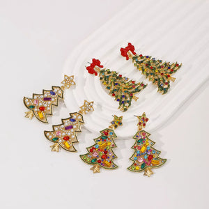 Festive rhinestone tree dangle earrings with red bows, white stars, and colorful gems.
