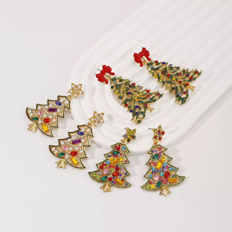 Festive rhinestone tree dangle earrings with red bows, white stars, and colorful gems.
