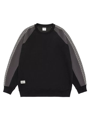 Black oversized raglan sleeve sweatshirt with contrast gray sleeves featuring zigzag stitching detail.