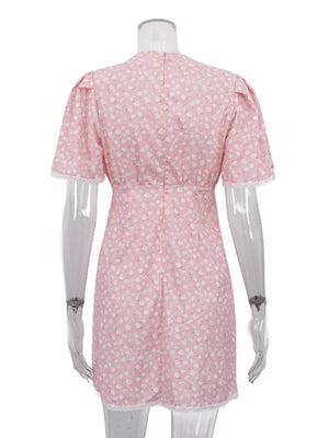 Pink floral print mini dress with short puff sleeves and lace trim
