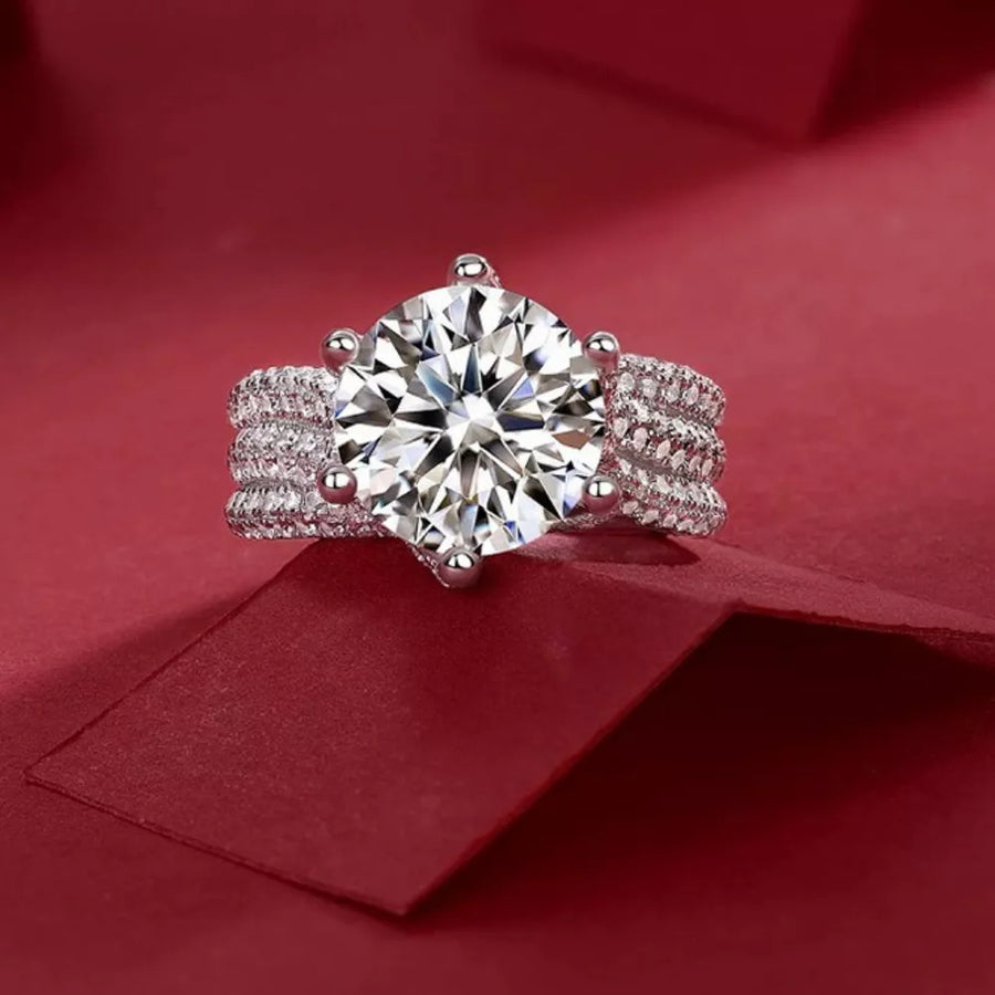 Exquisite 5ct moissanite solitaire ring in silver with pavé band.