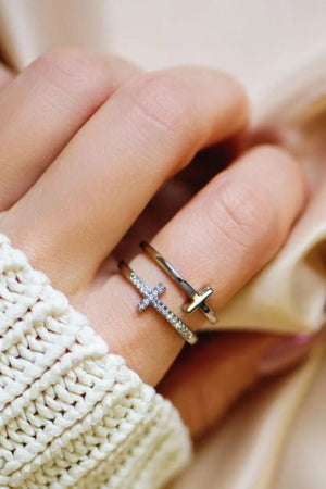 Silver double band ring with cross embellishments and a plain cross.
