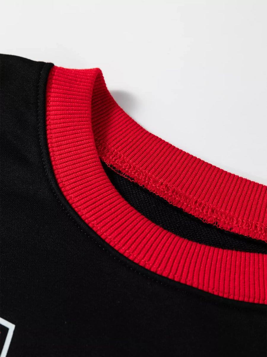 Black sweatshirt with red ribbed crewneck detail