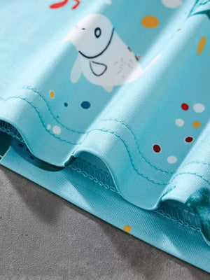 Light blue cotton t-shirt with a playful seal and polka dot print.